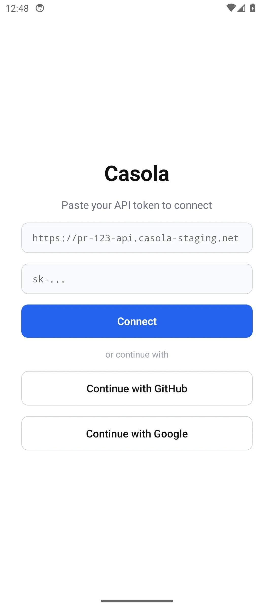 Mobile login screen showing API token input and OAuth buttons